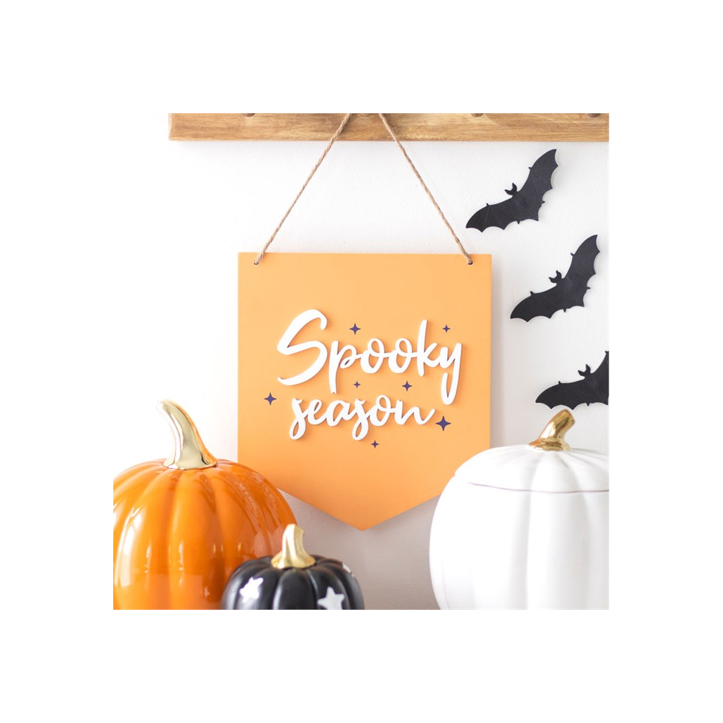 Spooky Season orange hanging sign with Halloween decor