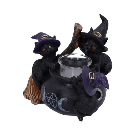 Witchy black cats surrounding a cauldron tealight holder