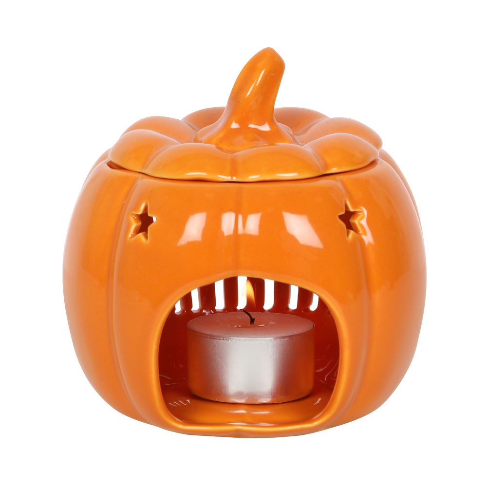 Rear view of pumpkin oil burner showing tealight opening