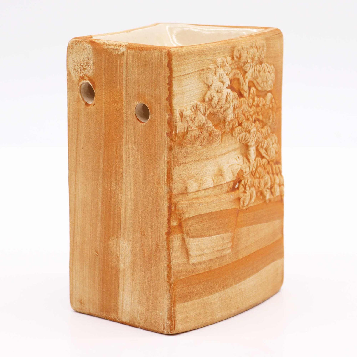 Side view of hand painted Bonsai ceramic oil burner