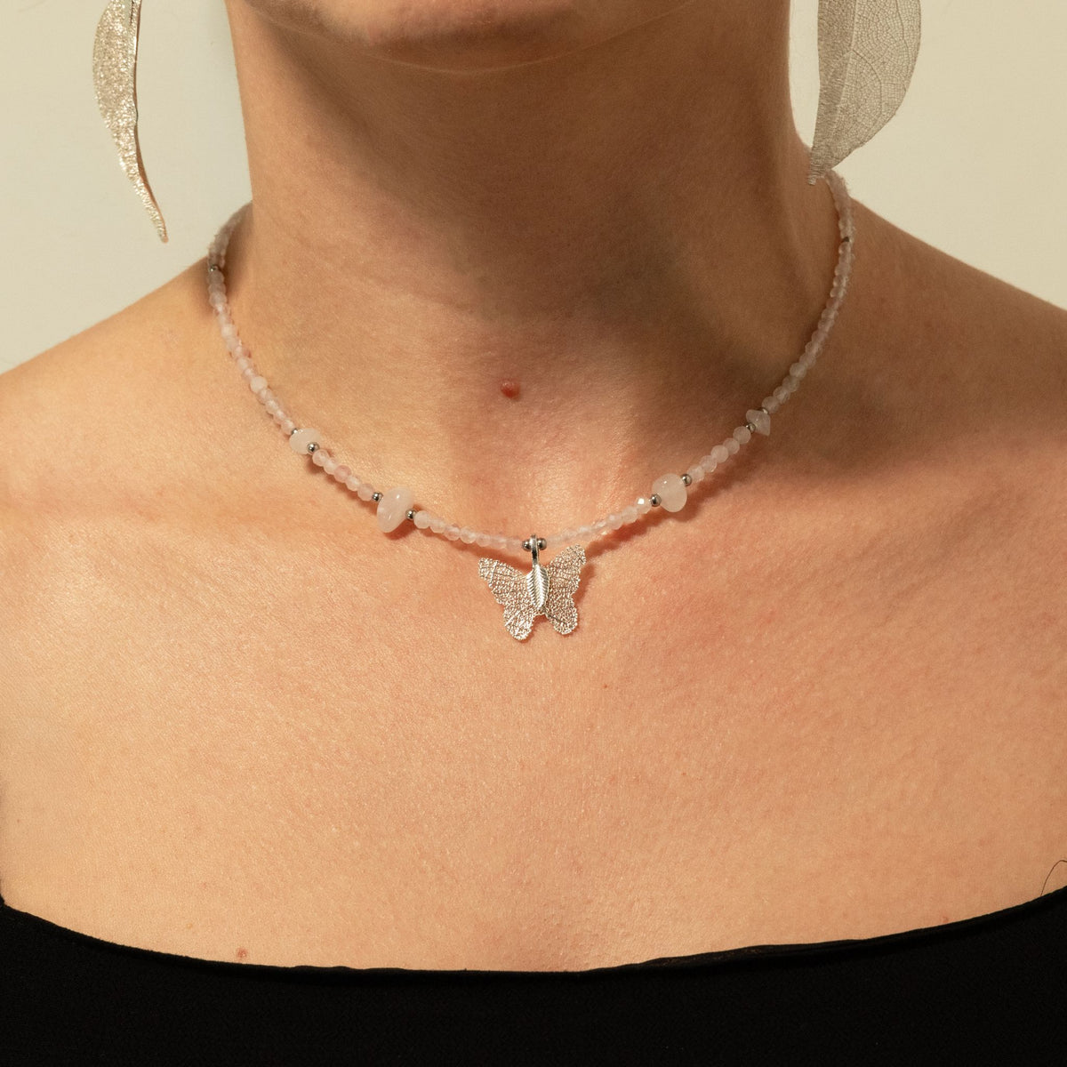 1. Nymph Rose Quartz gemstone necklace worn around the neck
