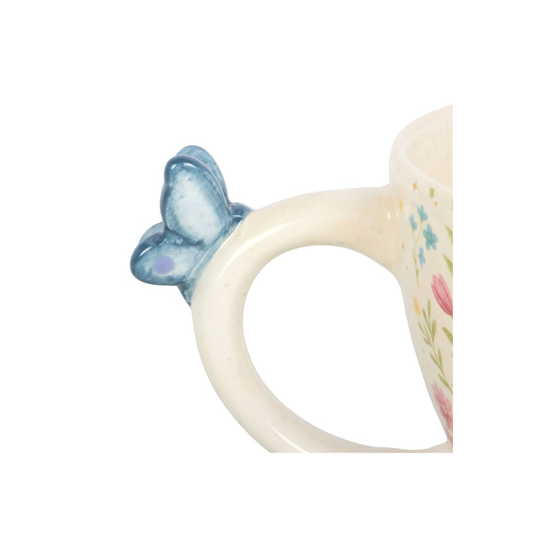 Blue butterfly handle detail on Luna Bloom floral mug