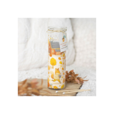 Decorative candle with fox design on a white background