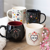 Love Lives Here Folk Heart Mug