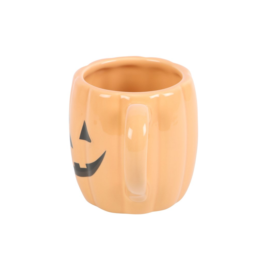 Side view of orange pumpkin shaped Halloween mug