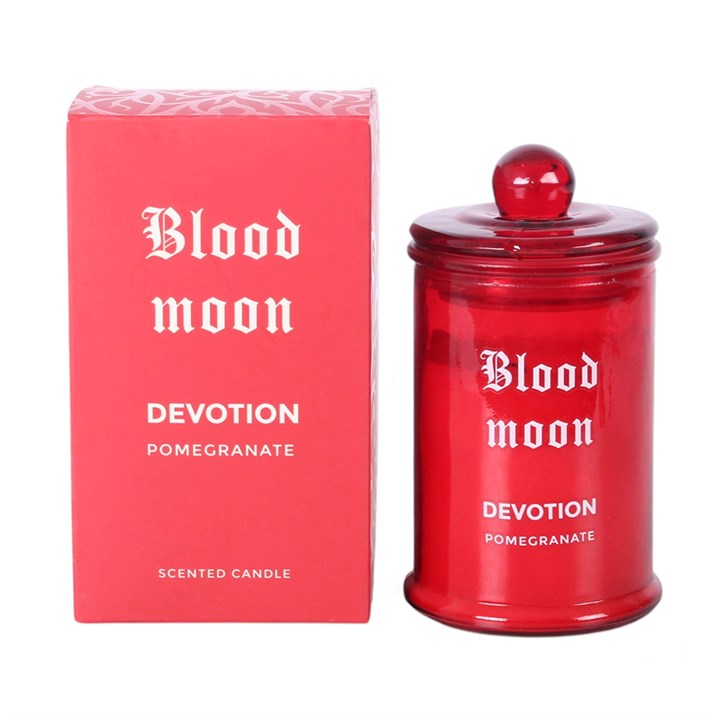 Blood Moon Pomegranate scented candle in red glass jar