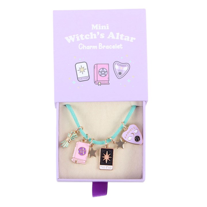 Mini Witch's Altar Charm Bracelet in a purple box with illustrations of a book, pentacle, and heart.