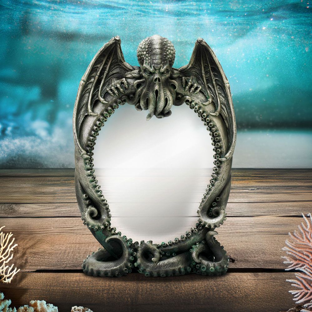 Cthulhu's Reflection Gothic Mirror displayed on a table