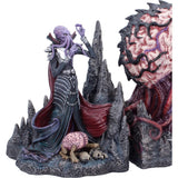 Close-up of Mind Flayer and Elder Brain bookend sculptures
