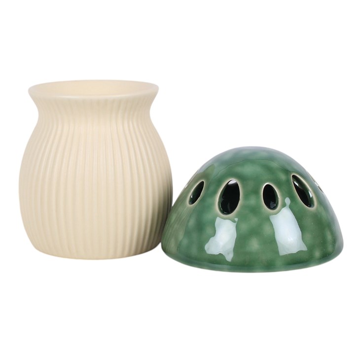 Removable cap on green mushroom oil burner