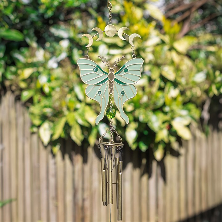 Moonphase moth windchime with green wings and metal chimes in garden