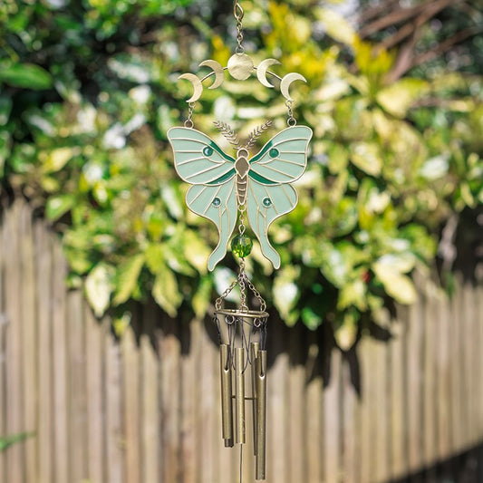 Moonphase moth windchime with green wings and metal chimes in garden
