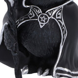Close-up of Featheros bird figurine holding its magical staff