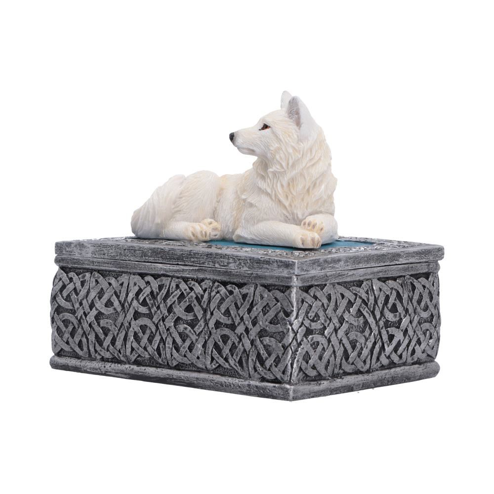 Side view of white wolf trinket box with patterned grey base