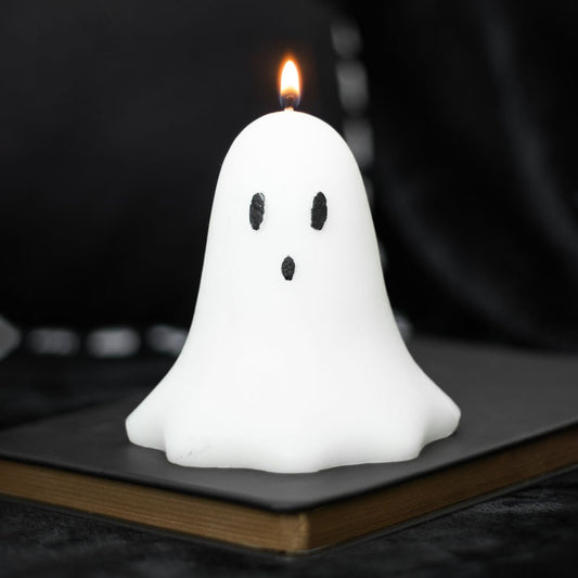 White Ghost Shaped Candle lit for Halloween