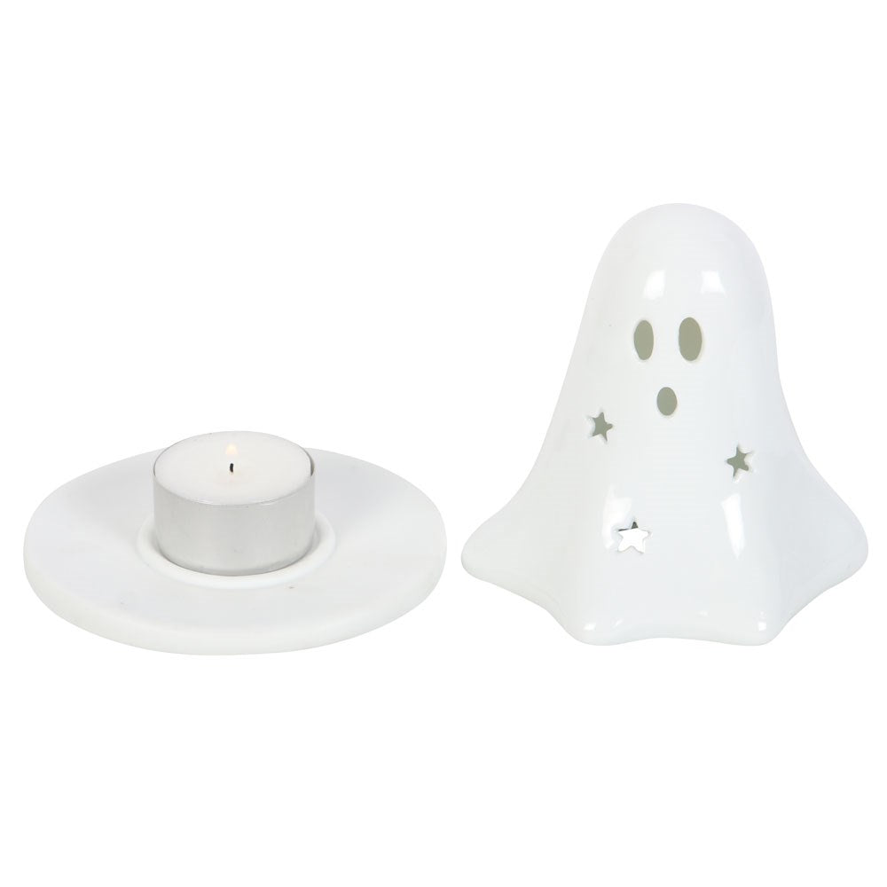 Ghost tealight holder with star cutouts
