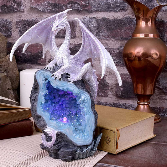 Glacial Custodian white dragon figurine on crystal geode
