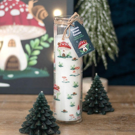 Spiced apple gnome tube candle in woodland display