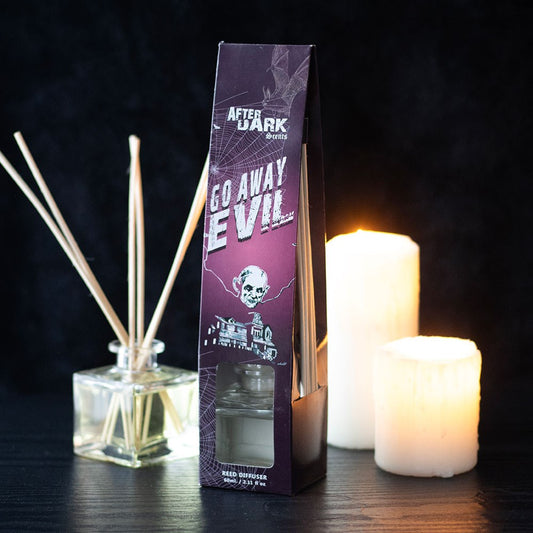 Go Away Evil rose reed diffuser with gothic packaging