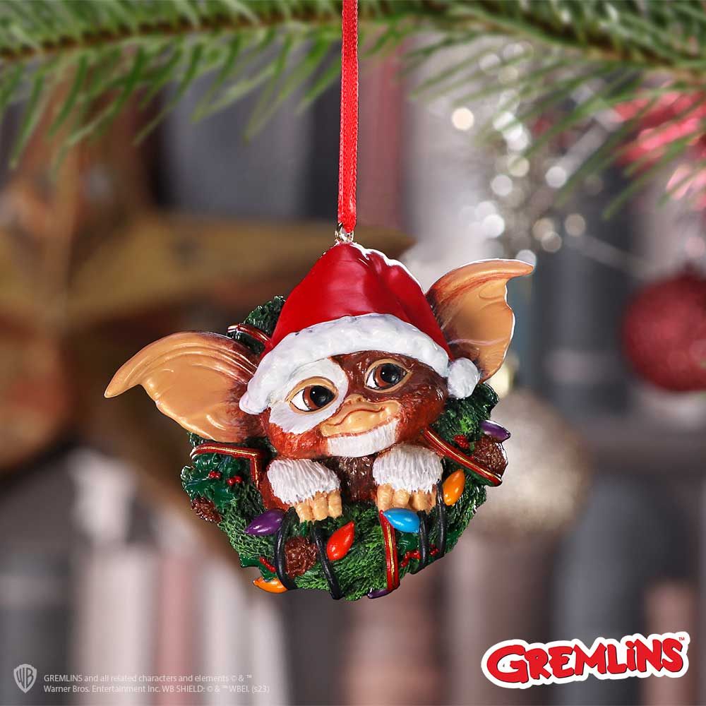 Gizmo Gremlins ornament hanging on Christmas tree