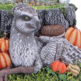 Close-up of Buckbeak and pumpkins on the snow globe base