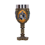 Decorative goblet with intricate design and Hufflepuff emblem on a white background