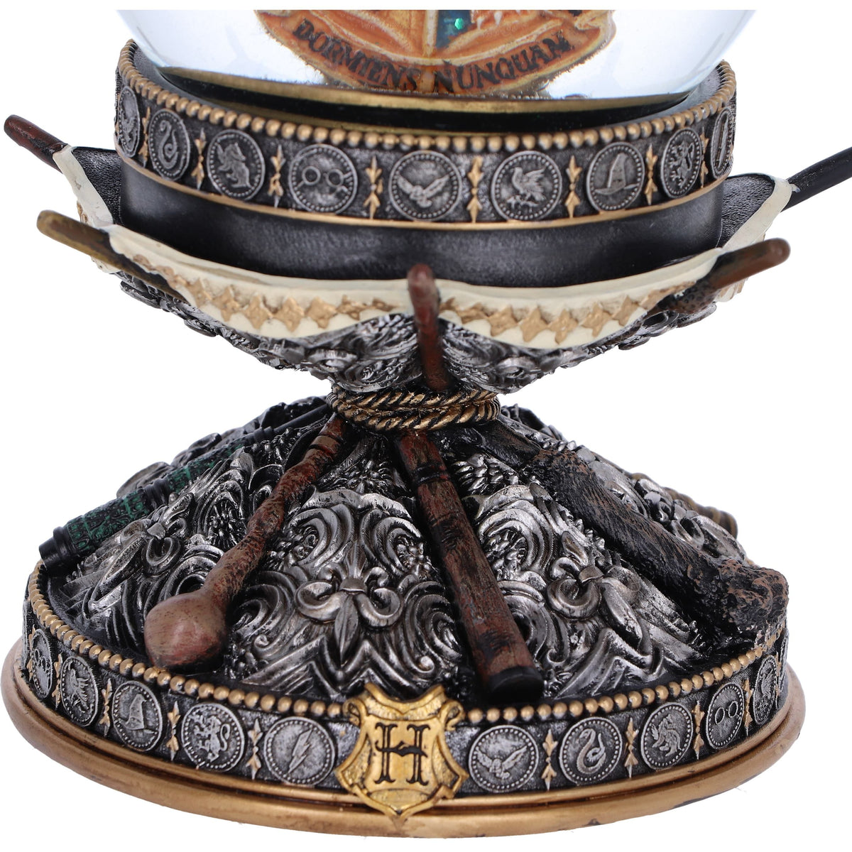 Detailed wand-themed base of Harry Potter snow globe
