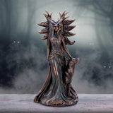 Statue of a woman with animal heads and a wolf, labeled 'Hekate', against a misty background.