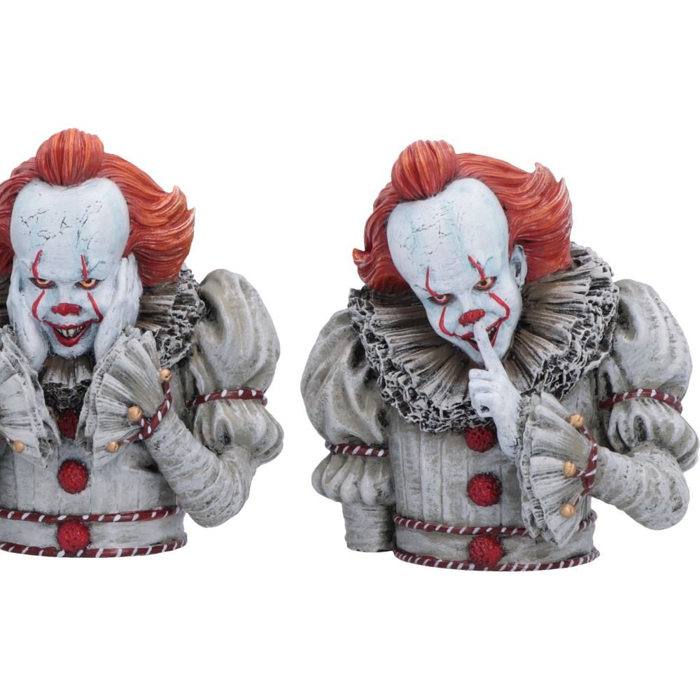 Close-up of Pennywise clown resin figurines