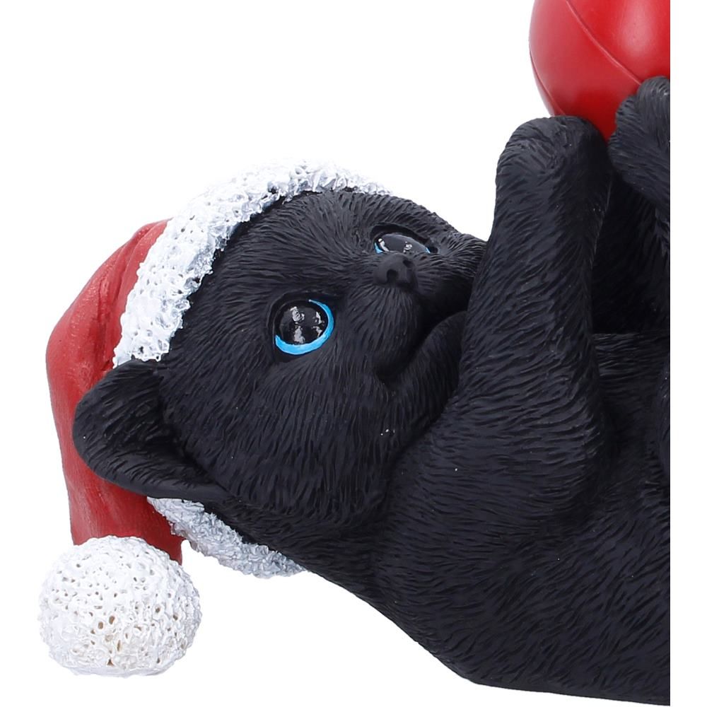 Close-up of Jingle Paws black cat figurine with blue eyes