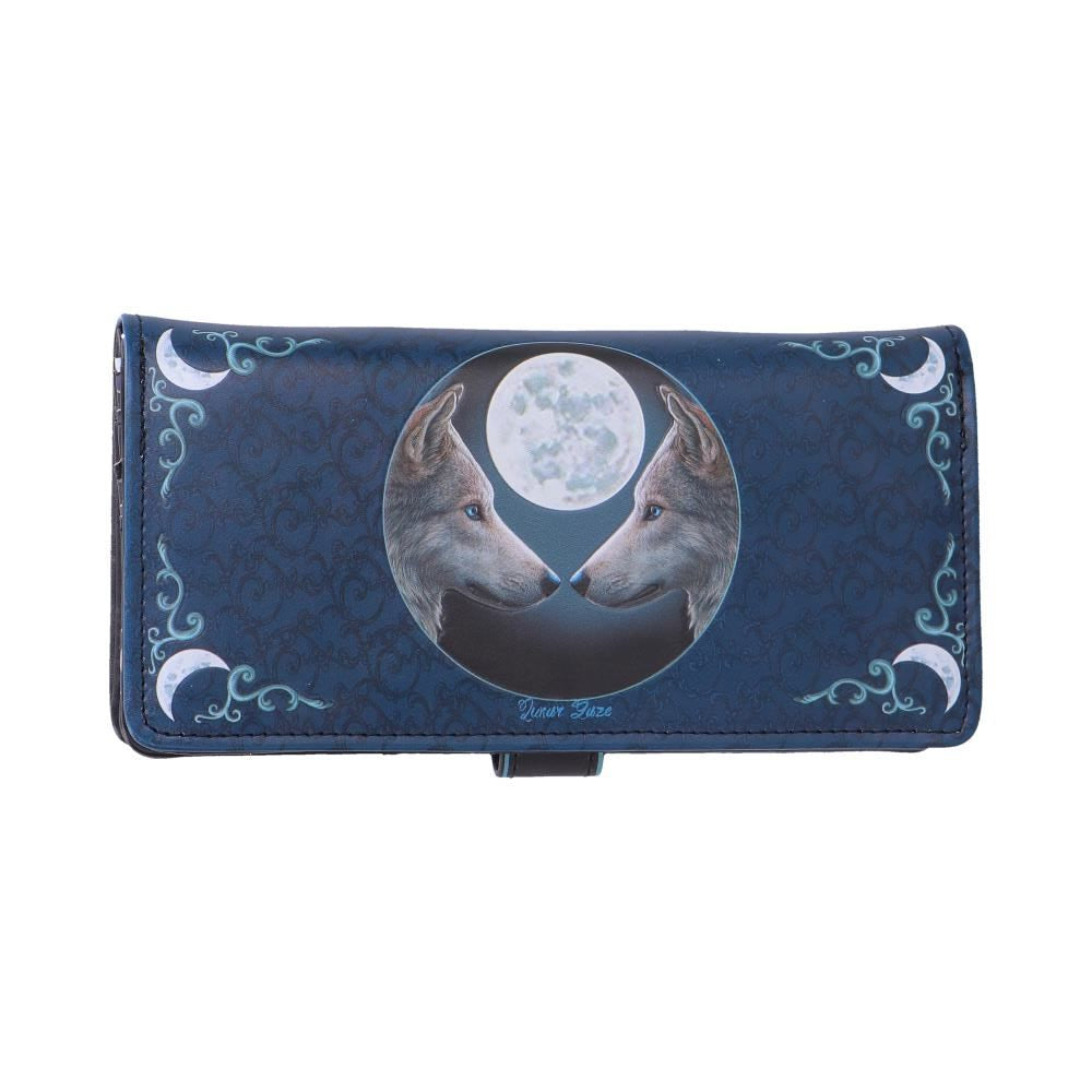Purse with wolves and moon design on a blue patterned background
