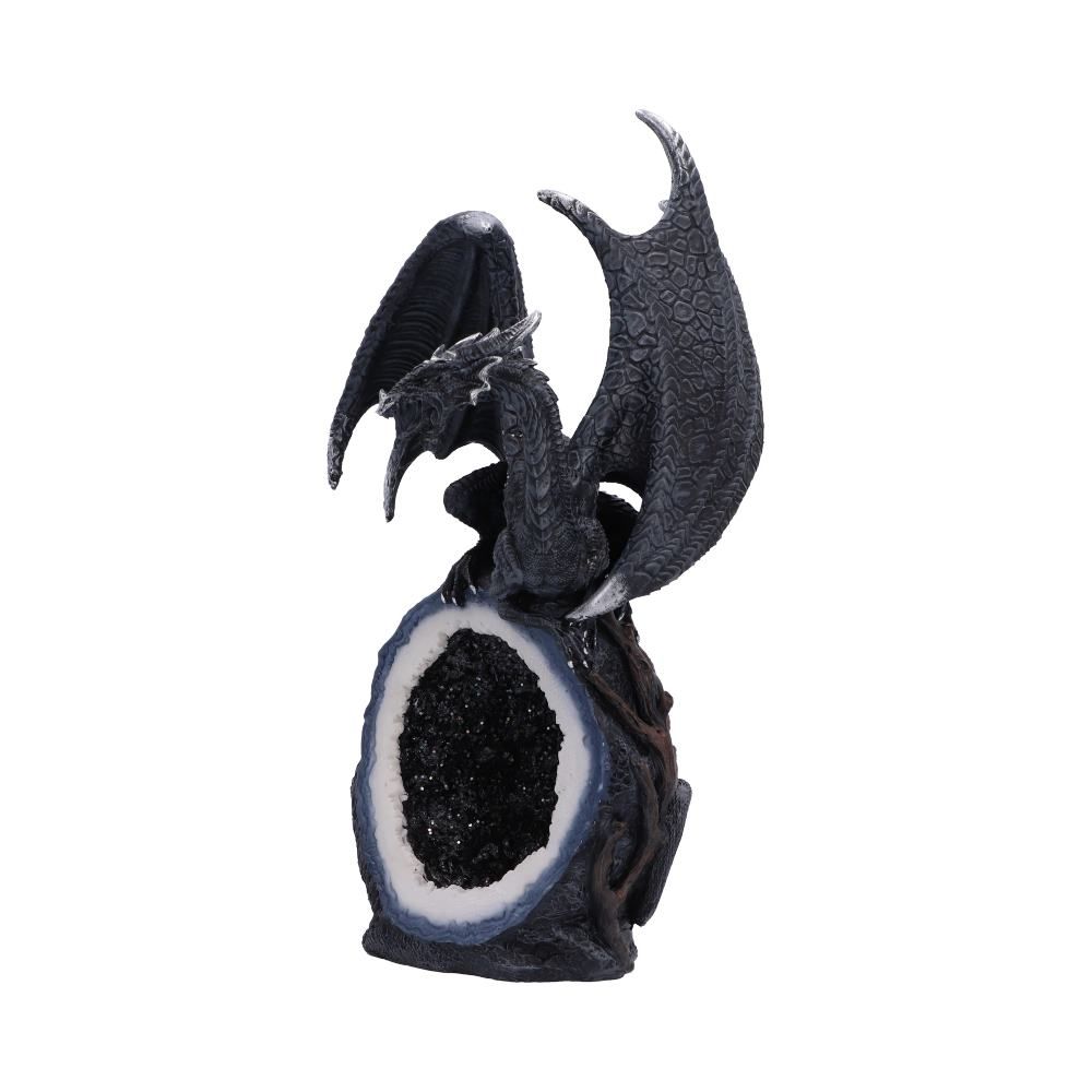 Black dragon perched on geode crystal figurine side view