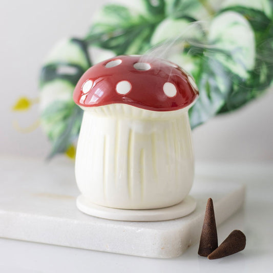 Red and white mushroom incense cone holder
