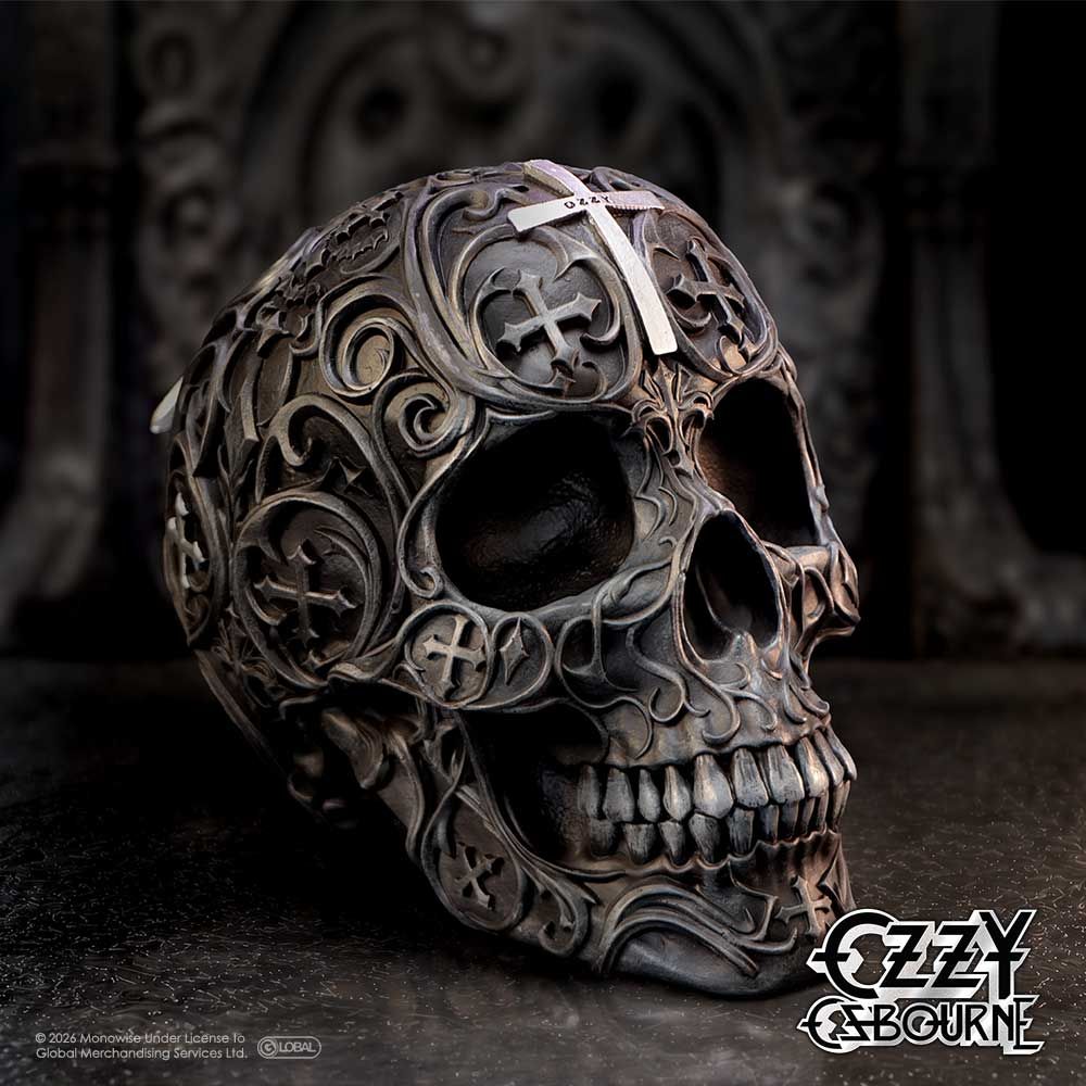 Ozzy Osbourne skull ornament displayed against a dark background