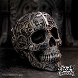 Ozzy Osbourne skull ornament displayed against a dark background