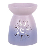 A lavender to light purple gradient ceramic oil burner with a sun and moon cutout design.
