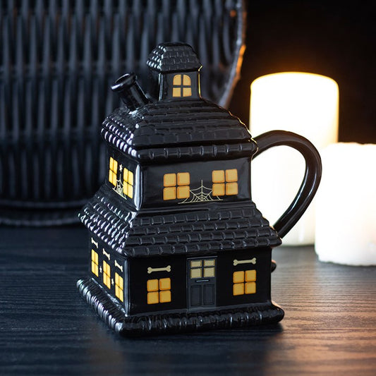 Black haunted house shaped ceramic mug