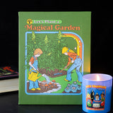 Book titled 'Let's Plant a Magical Garden' with a colorful illustration on a green cover, next to a blue candle.