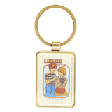 Keychain with cartoon design of two people and text on a white background