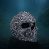 Scaled Remains Skull Figurine