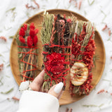 Smudge Stick with Rosemary and Red Flowers