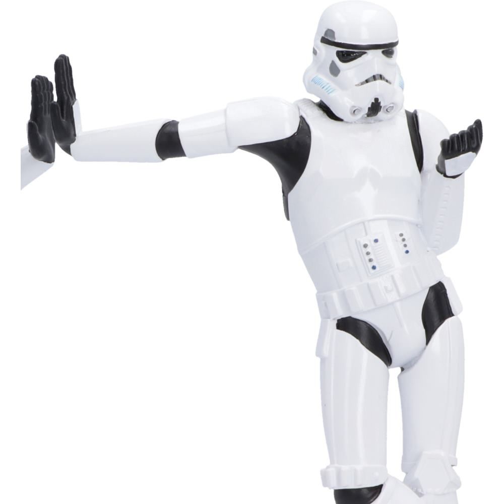 Close-up of relaxed Stormtrooper leaning against books