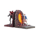 Angled view of Demogorgon and Eleven bookends with fiery portal