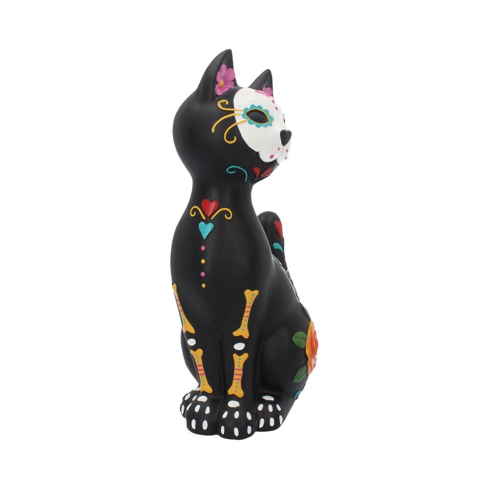 Side view of Sugar Kitty ornament with painted roses and sugar skull design