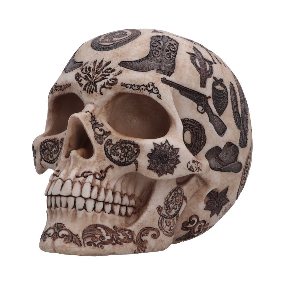 Side view of western skull ornament with detailed artwork