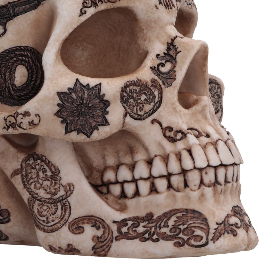 Close-up of western motifs painted across the skull