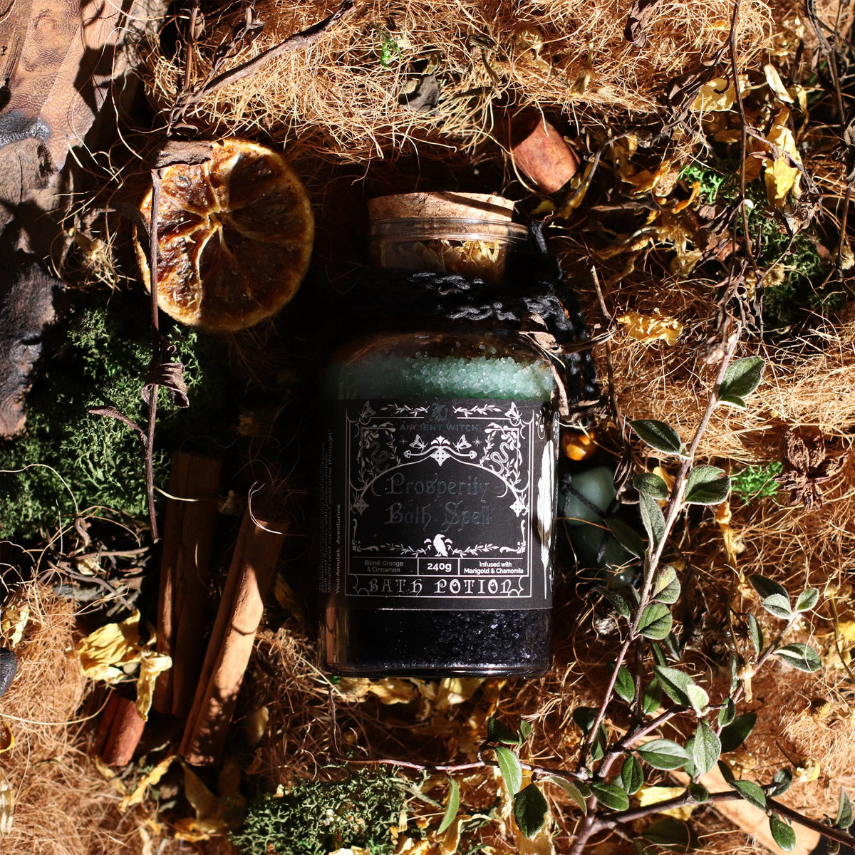 Prosperity Bath Spell Potion displayed with natural botanicals