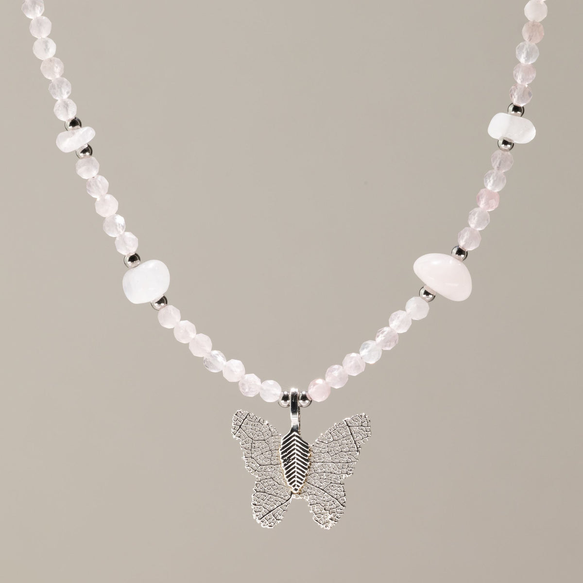 Nymph Rose Quartz gemstone necklace with silver-plated real leaf butterfly pendant