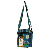 Blue patterned shoulder bag with a visible brand label on a white background