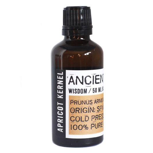 Bottle of Apricot Kernel oil with a label on a white background